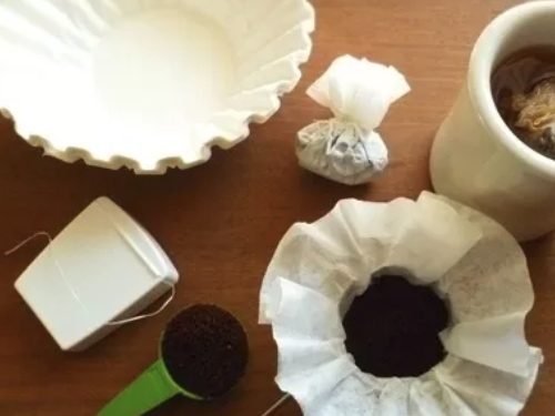 wrap coffee filter with floss coffee on campsite