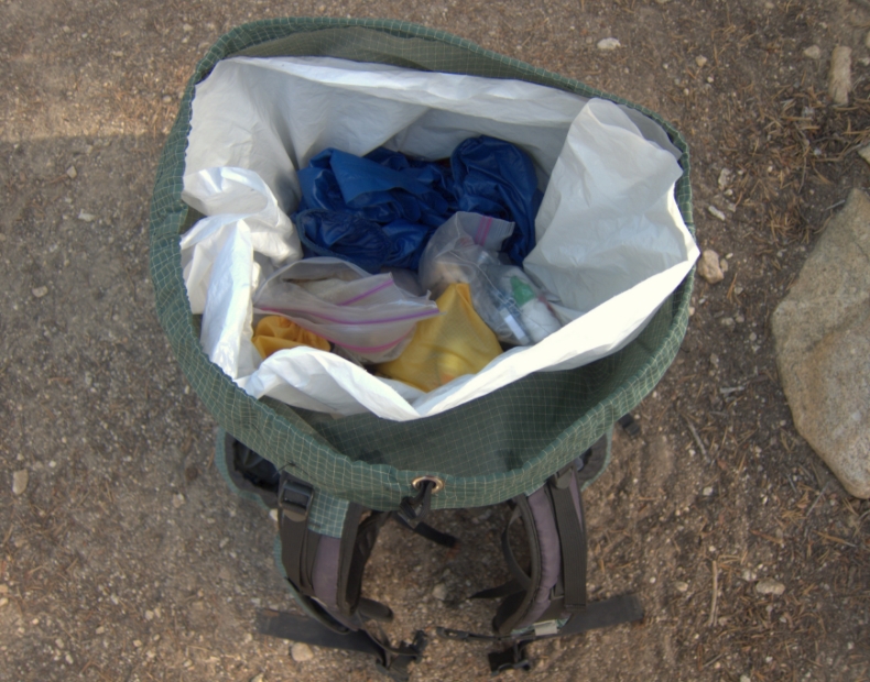 garbage bag liner in camp backpack