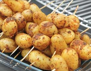 campfire roasted potatoes on skewers