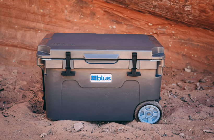 best camping cooler with wheels in dirt