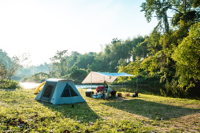 campsite set up next to a lake